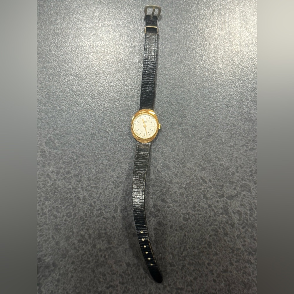 Vintage RSA Precision gold tone watch black leather strap